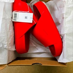 Mens size 11 Nike Calm slides